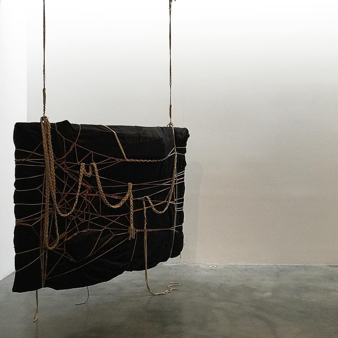 Laura Lima, Sem titulo (Agrafo), 2015, black tissue and dyed rope.